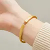 2026 Estilo Chino Lujo Ligero Joyería de Gama Alta Pulsera Grabada de Dragón y Fénix Diseño Abierto Pulsera de Aleación de Zinc Auspiciosa
