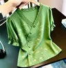 Camisa verde de verano de ajuste slim con ribete de encaje y manga corta para mujer, con un diseño fresco y de lujo ligero, un diseño de nicho que destaca