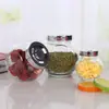 Fabricante de Frascos de Vidrio para Envasado de Alimentos Venta al por Mayor en Stock Botella de Vidrio Tipo Tambor Plano 100ml Botella de Vidrio para Miel y Mermelada