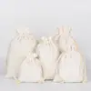 Bolsa de lona con cordón de fábrica en stock bolsa de algodón con cordón bolsa para empaque de arroz bolsa de almacenamiento logotipo imprimible en blanco