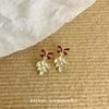 Pendientes de hoja de lazo rojo Otoño e Invierno Elegante Diseño de nicho Sensación Exquisita Luz Lujo Personalidad Moda Pendientes Versátiles