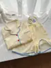 Pijama de cárdigan a cuadros simple para mujer, shorts de algodón nube de manga corta de verano, conjunto de dos piezas de ropa para el hogar para estudiantes, venta al por mayor transfronteriza