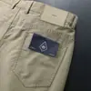 Pantalones casuales elásticos anti-pilling que absorben la humedad para hombre, primavera y verano, delgados, sin planchado, de cinco bolsillos, rectos, combinan con todo.