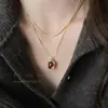 Collar apilable con colgante ovalado de ámbar para mujer, Lujo accesible, Cadena de suéter de nicho moderna y de alta gama, Accesorios de collar elegantes