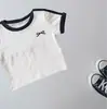 Camiseta Corta de Manga Corta Estilo Coreano para Niños 2026 Verano Nueva Moda Versátil Cuello Redondo Bloques de Color Bordada Top Corto
