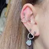 Europa y Estados Unidos transfronterizo AliExpress productos nuevos pendientes perforados pendientes de clavo de oreja con forma de corazón pendientes de clavo de oreja con cierre de rosca
