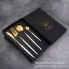 Juego de cubertería chapada en oro Juego de cuatro piezas de cuchillo, tenedor y cuchara de oro portugués Juego de caja de regalo de cubertería occidental Ventas directas de fábrica