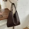Bolso de Mano Tejido Estilo Coreano Temperamento Bolso de Mujer 2026 Nuevo Pequeño Nicho Simple de Gama Alta Bolso Cubo Bolso de Hombro Único para el Brazo