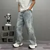 Nuevos pantalones vaqueros desgastados y lavados de estilo urbano para primavera y verano para hombre, con un diseño fino, holgado y de pierna recta, perfectos para uso casual