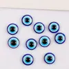 Venta al por mayor de fábrica resina ojo azul oblea Ojo Turco del Diablo ojo azul cuenta plana azul accesorios para ropa