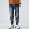 Jeans Elásticos de Primavera/Verano 2025 para Hombre, Pantalones Sueltos de Talla Grande y Corte Slim, Pantalones Harem Jogger para Hombre con Parcheado Marca de Moda
