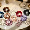 Moderna y de Alta Gama Gomas para el Cabello de Satín con un Diseño Elegante y Brillante de Alta Elasticidad. Suministro al por mayor. Venta directa del fabricante
