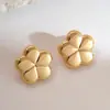 Pendientes de Botón Metálicos Brillantes con Flor Cruzada Europeos y Americanos, Pendientes de Moda y Versátiles con un Toque de Lujo Ligero y de Alta Gama, Venta al por Mayor