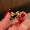 Anillo abierto vintage medieval al por mayor moda oro nicho circón rojo personalidad lujo ligero accesorios de alta gama para mujeres