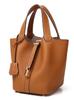 Bolsa linda bolsa de la suerte bolso de mano de cuero genuino bolsa de cesta de verduras bolsa mediana bolsa de piel de vaca de primera capa Bolsa pequeña de bloqueo popular en la red