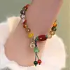 Pulseira de Vidro com Fragmentos de Jade Borboleta Estilo Novo para Mulheres, Pulseira de Girassol de Cristal Colorido Explosivo de Nicho, Em Estoque para Venda no Atacado para Barracas de Mercado