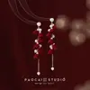 Pendientes de Perlas con Lazo Rojo para Otoño e Invierno Pendientes de Alta Gama para Mujer 2025 Nuevo Estilo Chino Pendientes Rojos