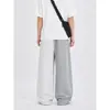 Pantalones de chándal anchos asimétricos de moda estilo americano 2026, unisex, corte holgado, tela fluida, para streetwear casual y pantalones deportivos
