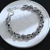 Pulseira Cruzada Popular Europeia e Americana Transfronteiriça com Zircônia Preta para Mulheres Pulseira Flor de Íris Retro Hip-Hop Dropshipping