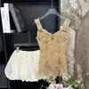 Traje de Dos Piezas Estilo Desolación de Gama Alta, Camisola de Mezclilla Ajustada con Borlas Retro, Falda Voluminosa Flor de Capullo