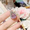 Camellia Moda de Lujo Alto Sentido Polvo Papalacha Diamante Colgante Chapado en Oro de 18K Elegante Pulsera de Flor conjunto