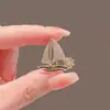 Broche único de perlas con diseño de corazón 2024 nueva moda otoño e invierno corsage accesorios de alfiler delicados para mujer Corea del Sur
