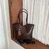 Bolso de hombro tipo tote de gran capacidad transfronterizo, nuevo diseño de moda 2026, elegante y minimalista, de color liso