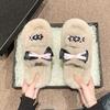 Pantuflas Mao Mao con lazo populares en Internet para mujer, pantuflas gruesas de felpa dulce para el hogar, pantuflas de algodón antideslizantes para dormitorios de estudiantes, otoño e invierno.