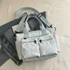 Bolsas de Luxo para Mulheres 2026 Primavera Nova Bolsa de Ombro para o Dia a Dia Moda Simples Design de Nicho Bolsa de Ombro Único Transversal