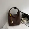 Bolso de Gamuza de Alta Gama para Mujer 2025 Nuevo Otoño e Invierno Retro Versátil Bolso Cubo de Hombro Popular Bolso Cruzado para el Trabajo