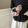 Bolso de Mano Mini Plegado Color Block Estilo Nuevo Verano 2026 Transfronterizo para Niñas con Moño de Dibujos Animados, Bolso Pequeño de Hombro Cruzado
