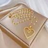 [Acero de titanio] exagerado amor luz lujo cruzado banquete transfronterizo boda collar femenino Red popular todo partido cadena de clavícula cadena de acero de titanio