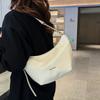 Bolsa retrô de alta qualidade de cor sólida feminina 2025 nova primavera e verão all-match bolsa de ombro simples bolsa transversal nicho bolsa de bolinho