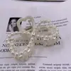 Suministro directo de fábrica versión coreana de Pinza para el pelo de perla Clip de placa elegante de celebridad de internet clip de sujeción para la parte trasera media del cabello accesorios para el cabello pinza de sujeción al por mayor