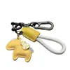Nuevo Producto Riqueza Inminente Colgante Creativo de Cuero Caballo Pequeño Riqueza Inminente Cuerda Tejida Llavero de Coche Bolso Venta al por Mayor Regalo
