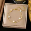 [Pulsera de Moda Caliente Mejor 2] Temperamento Europeo y Americano de Alta Gama K Oro Cruz Acero de Titanio Pulsera Diseño Nicho Estilo Frío Mujeres