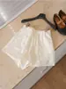 Shorts de linho de cintura alta com cordão, textura relaxada e casual, versátil e ótimo para alongar as pernas, amigável para tipos de corpo pera.
