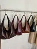 Bolsa feminina de grande capacidade transfronteiriça 2026 nova bolsa de ombro versátil para compras bolsa tote simples casual para o dia a dia