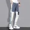 Pantalones cruzados nuevos para hombre, estilo coreano, modernos, corte holgado, estilo ins para estudiantes, pantalones cargo chic casual cortos, marca de moda, con puños en los tobillos