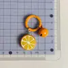 Llavero colorido de frutas con cascabeles, sandía, granada, guayaba, colgante de juguete de comida en miniatura, accesorio versátil para bolso