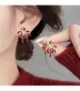 Nuevos Pendientes de Fuegos Artificiales Rojos para Mujer, Tachuelas Únicas de Nicho para Otoño e Invierno, Estilo Popular de Lujo con un Toque de Alta Gama, Agujas de Plata S999
