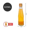 Garrafa de vidro de óleo de gergelim com tampa meia jin por jin frasco de perfume à prova de vazamento rosca comercial cônica selada garrafa vazia de óleo de gergelim