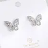 Aretes de Alas de Mariposa Huecas Estilo Simple Ins Fresco Pequeños y Exquisitos Aretes de Circonita Artificial