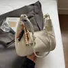 Bolsa de Ombro Estilo Coreano Nicho para Mulheres, Novo Modelo Primavera 2026, Bolsa para o Trabalho/Deslocamento, Bolsa de Ombro Cruzada Formato Dumpling, Bolsa Meia-Lua