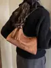 Bolsa de Hombro para Mujer Estilo Nuevo Simple y de Moda Otoño e Invierno 2026 Transfronteriza Bolso tipo Baguette para Debajo del Brazo Bolso de Mano Casual para Ropa de Trabajo