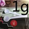 Venta al por mayor de fábrica cucharas pequeñas de plástico 1g 0.5g 0.25 gramos cuchara dosificadora de polvo mini cuchara medidora se puede imprimir LOGOTIPO