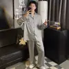 Pijama para Hombre Primavera y Otoño Seda de Hielo Manga Larga 2026 Nuevo Dibujos Animados Elegante Juvenil Seda Otoño Conjunto de Ropa para el Hogar