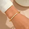 Moda Europea y Americana de Moda Joyería de Moda Personalizada: Pulsera de Acero Inoxidable con Concha Blanca y Piedras Incrustadas, Simbolizando Riqueza y Elegancia para Mujeres