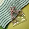 Nuevo Rizador de Pestañas Transparente Gris sin Borde con Dientes de Peine Rizador de Pestañas de Ángulo Amplio con Dientes de Peine Rizador de Pestañas sin Borde
