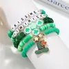 Europa y América. Pulsera Verde del Día de San Patricio Apilada con Cuentas de Arcilla Suave, Decoración de Colgante Hecho a Mano de Trébol de Cuatro Hojas de Buena Suerte